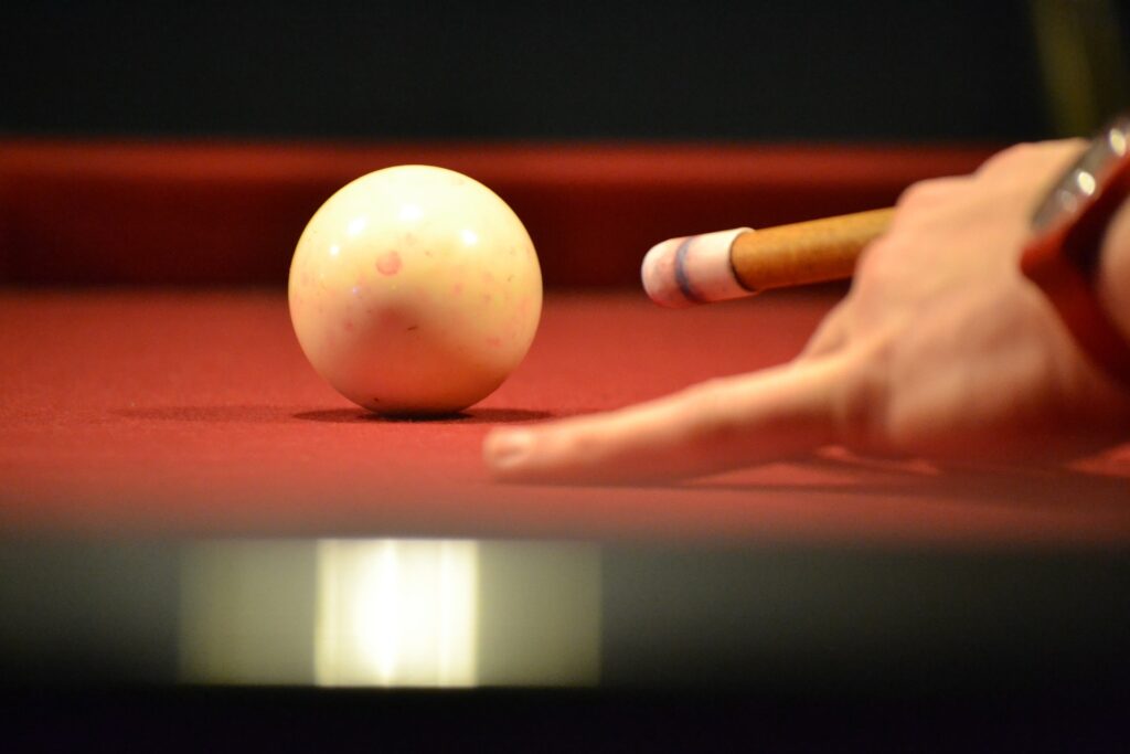 Close up of a pool ball made out of polyester being used in a game