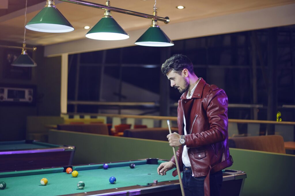 Man playing billiards