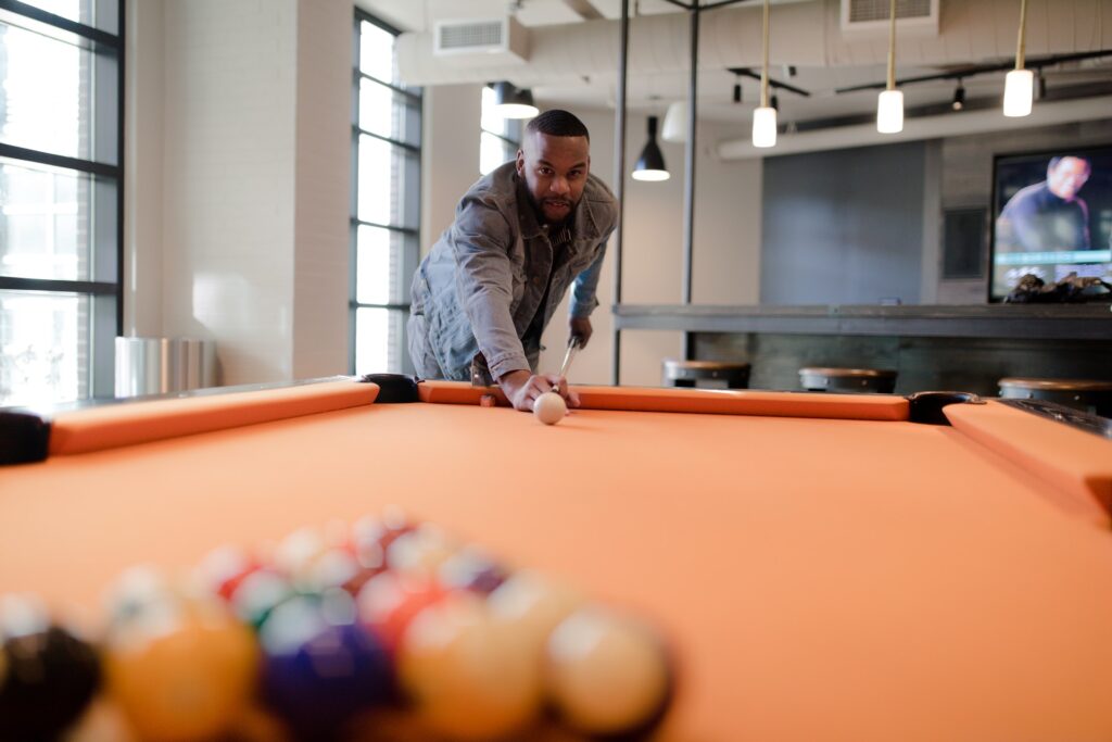 Man ready to hit the cue ball